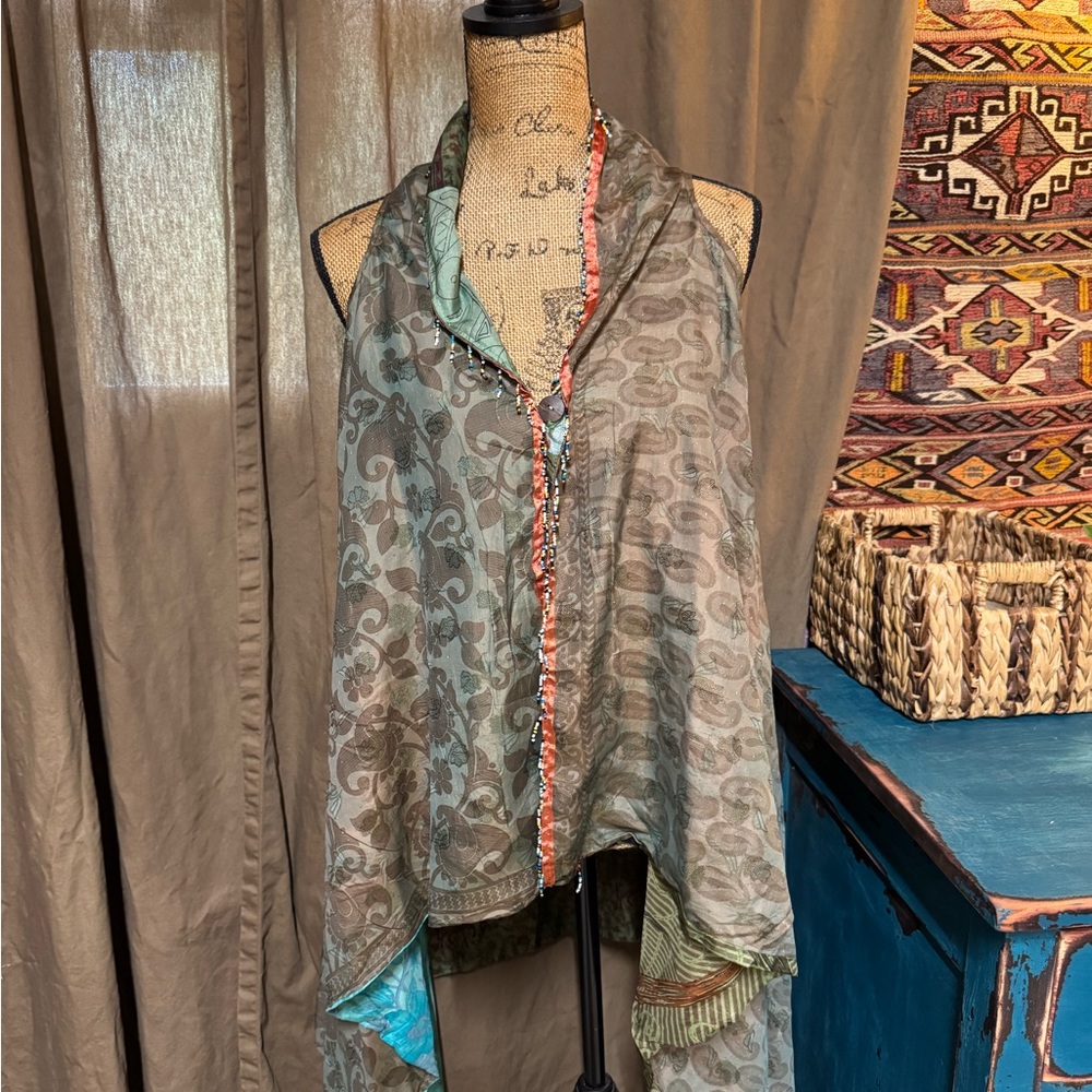 100% silk boho reversible vest. Hand stitched beads. Blue, green.multi-color